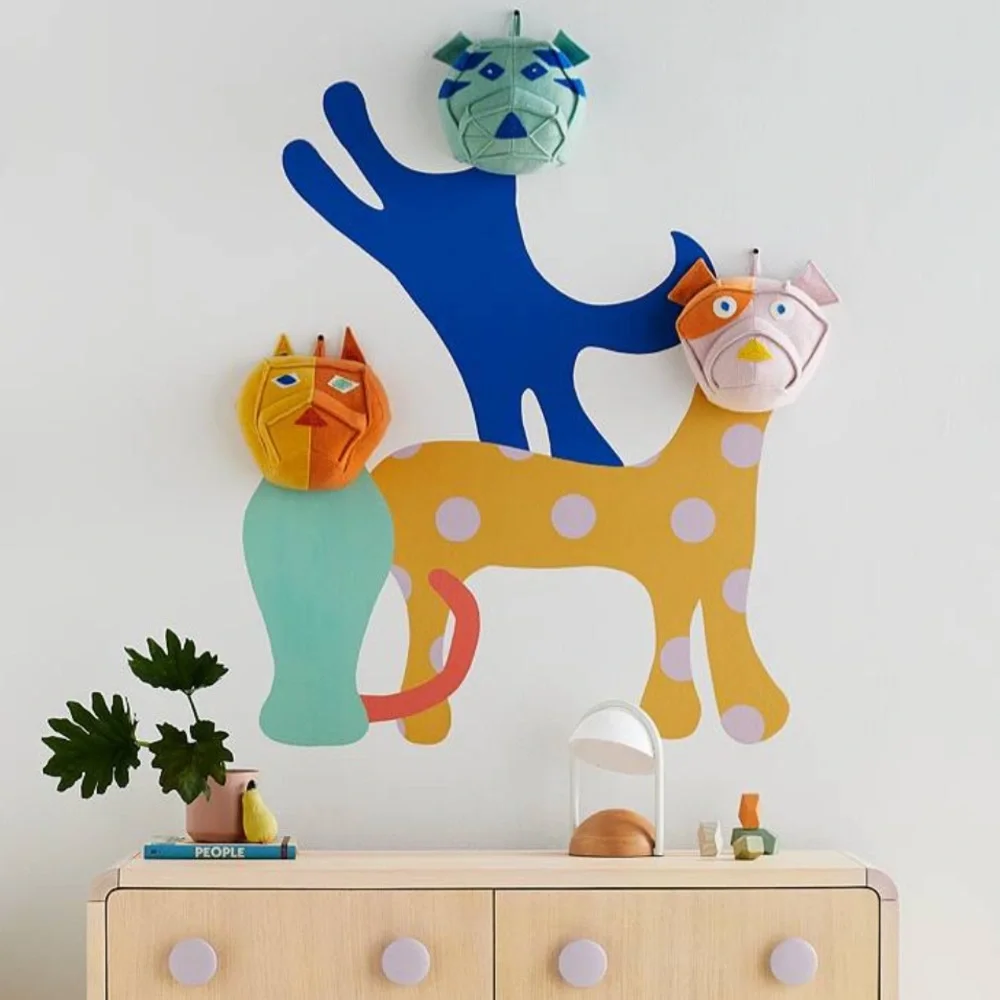 Domino x Crate & Barrel colorful dog head wall decor